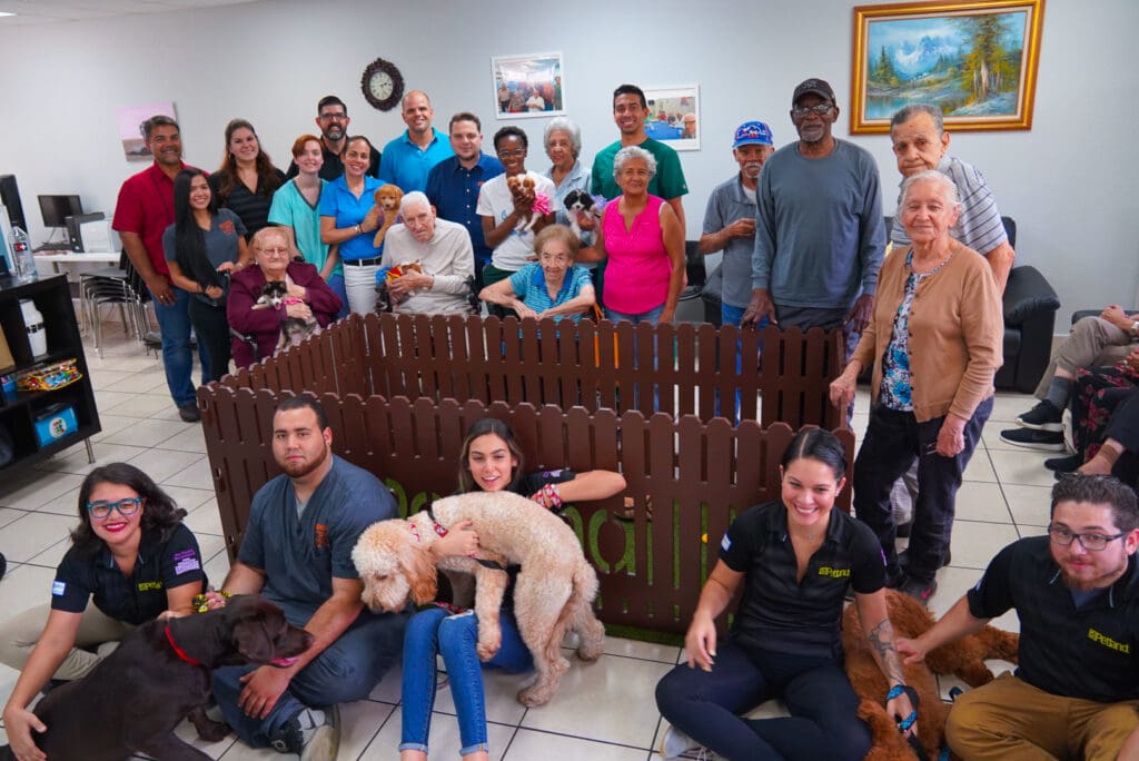 Petland Texas picture of patients at Always At Your Side Adult Day Care with cute Petland puppies.