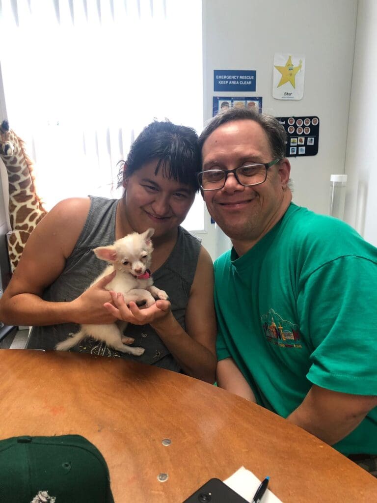 Petland Texas picture of WOW Center patients with cute Chihuahua puppy.